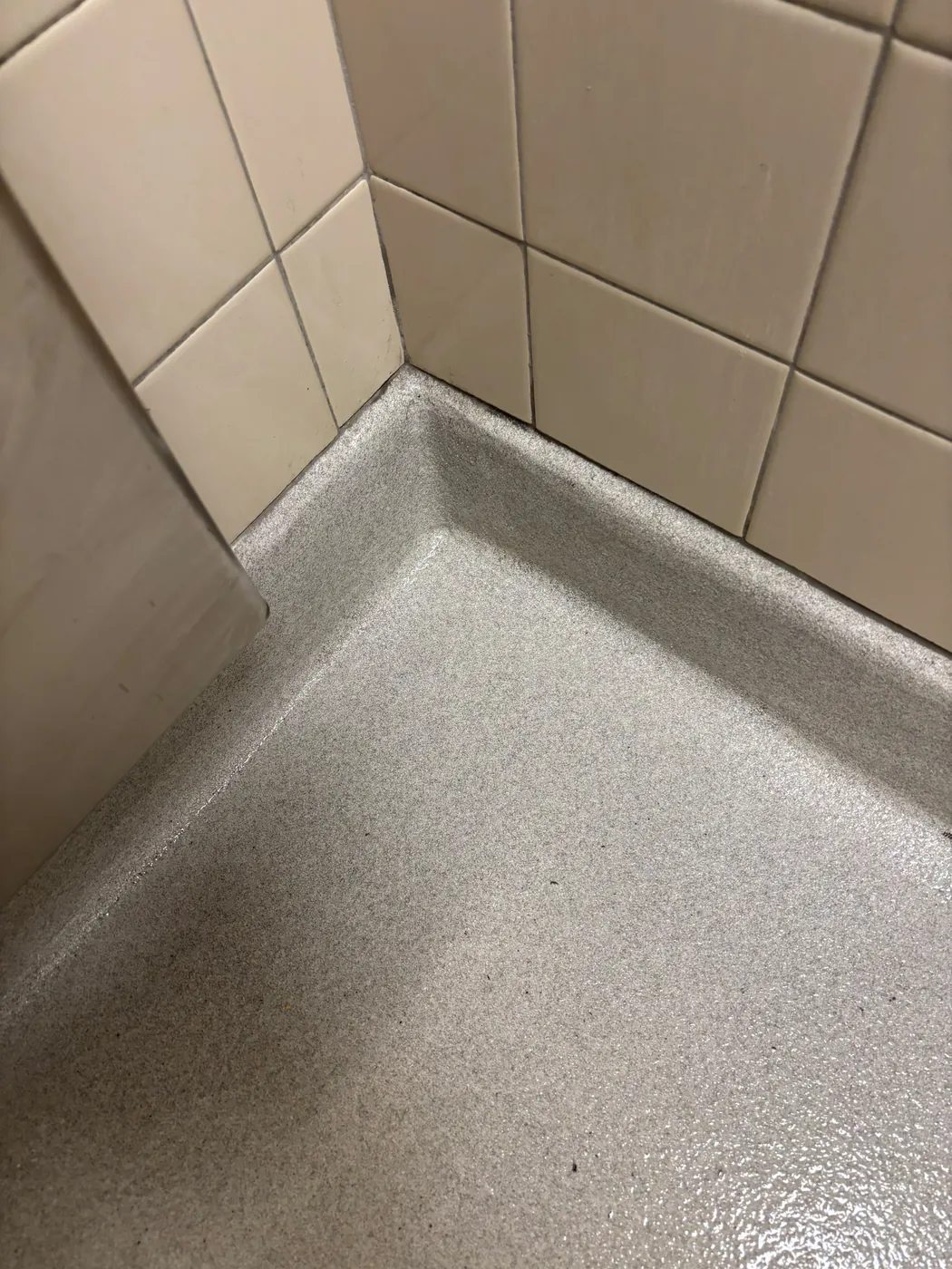 Tiled shower pan built in a bathroom remodel