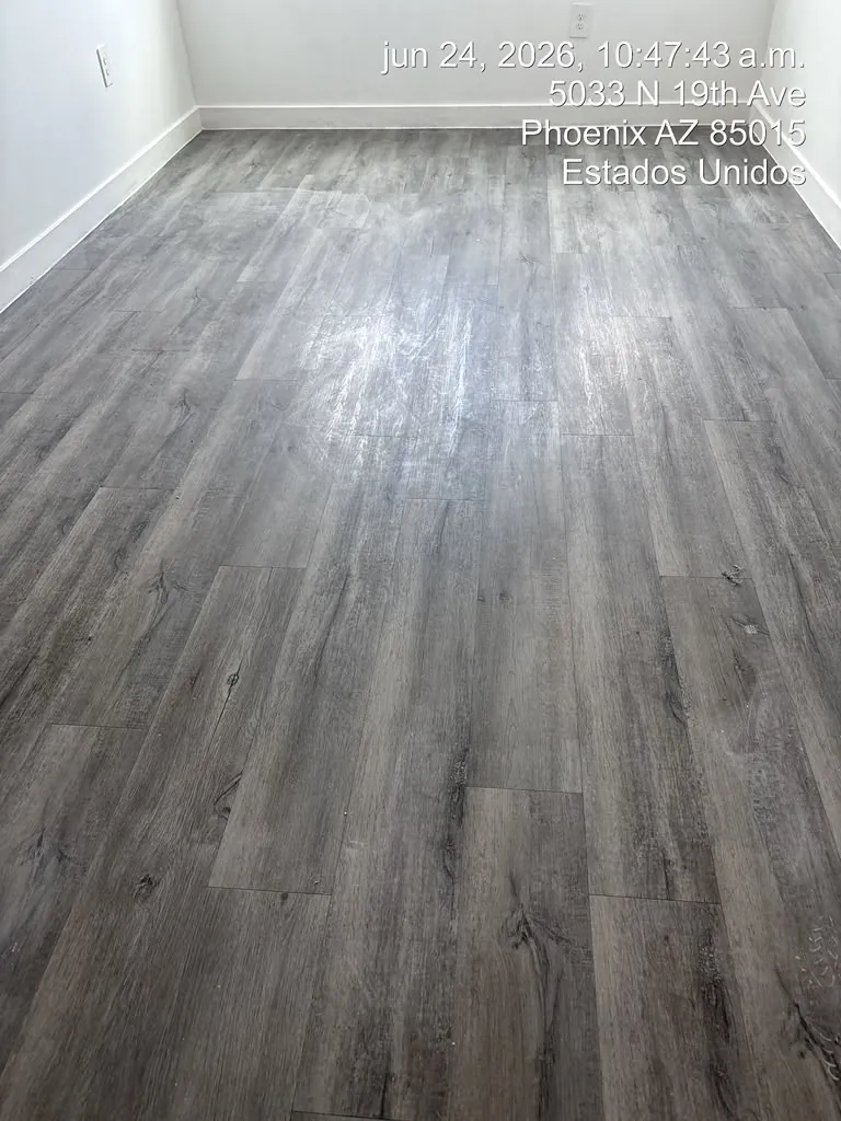 New plank flooring in a freshly painted room